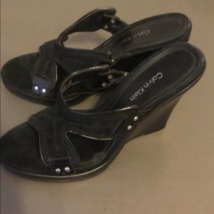 Calvin Klein black suede & patent leather wedges.